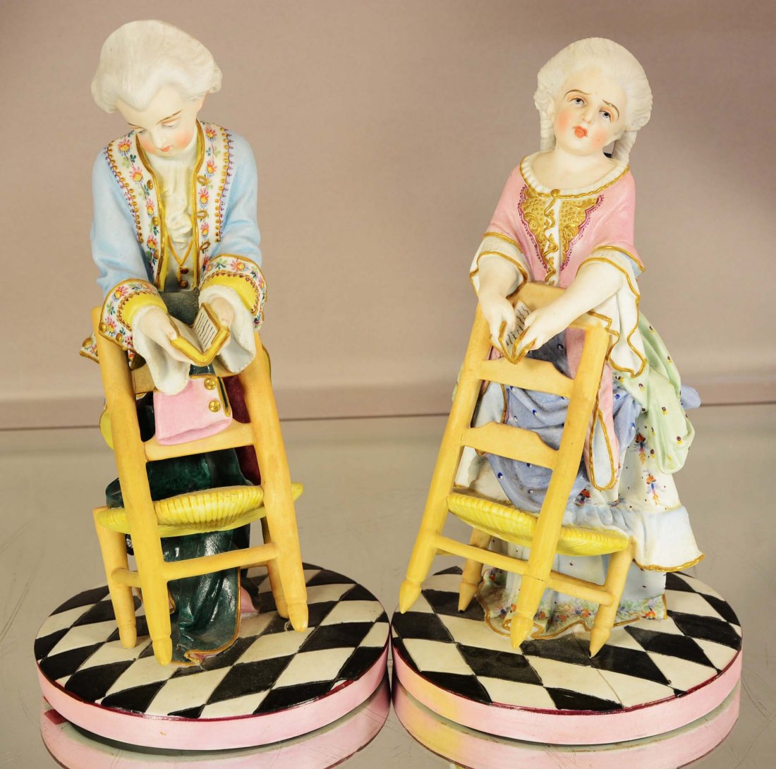 Two German porcelain figures leaning on chair (1 of 2)