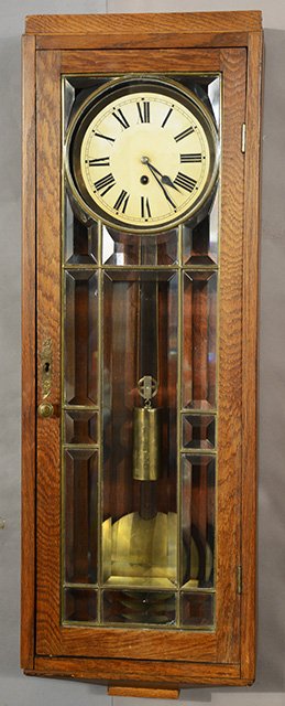 German Regulator Wall Clock: German Regulator Wall Clockin oak case with individual beveled glass in doors, time only, 34”t, Ca. 1910.