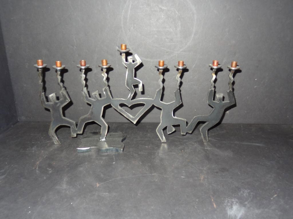 Menorah: Ivan McLean Dancing Figures: Handmade Steel Dancing Figures Menorah by Ivan McLean 22" long x 10" high x 5" wide.