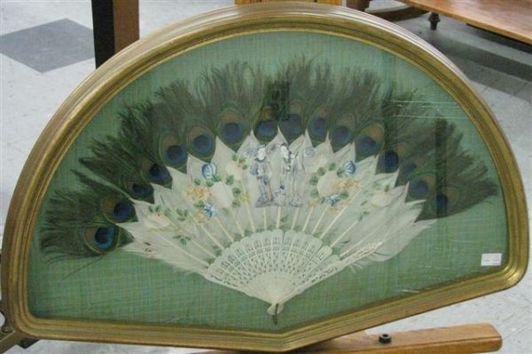 Fan, Hand Painted Oriental Scenes on Peacock Feat: Fan, Hand Painted Oriental Scenes on Peacock Feathers, Celluloid Frame, 13'' H x 22'' W, Custom Framed, $100-$200.