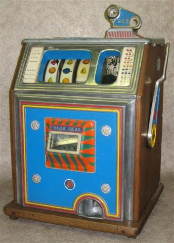 Slot Machine, Watling, Blue Seal, Quarter Type, Ea: Slot Machine, Watling, Blue Seal, Quarter Type, Early to Mid 20th Century, 20'' H x 15 1/2'' W x 14 1/2'' D, Working Cond., $500-$700.