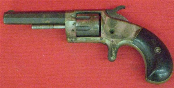 Whitneyville Armory Model 1 Serial #7019 Revolver,: Whitneyville Armory Model 1 Serial #7019 Revolver, .22 Rim Fire cal., Single Action, 7 Shot, 2 3/4'' Barrel, Nickel Plated Brass Frame, Spur Trigger, Produced 1871-1876 and Sold for Approx. $3.50, 6 1