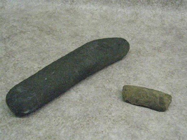 Hammer and Scraper, Neanderthal Paleolithic Stone A: Hammer and Scraper, Neanderthal Paleolithic Stone Age, from Western Europe, Hammer: 10 1/2'' L, Scraper: 3 1/4'' L, $75-$125.