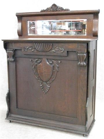 Murphy Bed, Ca. 1890-1910, Oak, Applied Carvings, : Murphy Bed, Ca. 1890-1910, Oak, Applied Carvings, Beveled Mirror in Back, 75'' H x 54'' W x 20'' D, Folds out to Bed, $100-$200.