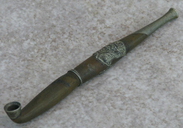 Opium Pipe, Brass, Silvered Tiger and Other Embelli: Opium Pipe, Brass, Silvered Tiger and Other Embellishments, 18th-19th Century, 2 Piece Design, 6 1/4'' L, from the Ware Family Collection, $75-$100.