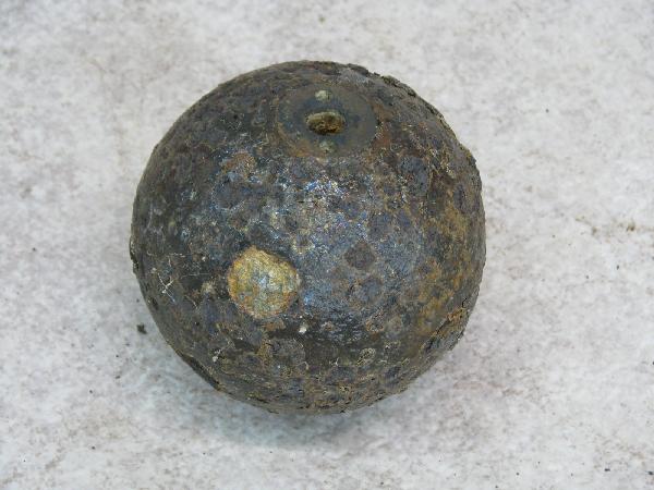 Artillery Shell, 12 Pounder, Confederate Spherical: Artillery Shell, 12 Pounder, Confederate Spherical Case Shot, Side Loader, Brass or Bronze Fuse, Lead Plug, Rendered Inert, 4 1/2" Dia., $150-$250.