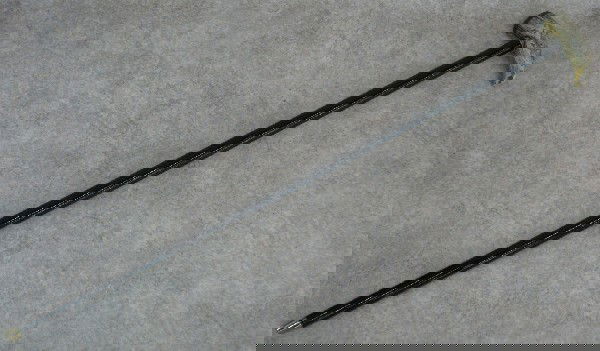 Walking Cane, Black Lacquered Finish, Faux Scrimsh: Walking Cane, Black Lacquered Finish, Faux Scrimshaw Horn as Handle, Handle Marked with Images of Whaling Ships and Fish, 34 5/8'' L, $50-$100.