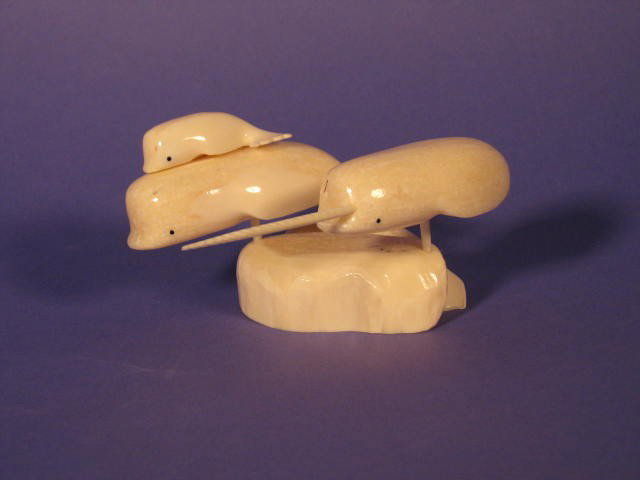 Inuit Art - Pod of Whales: Inuit Art, Pod of Whales, Ivory or Bone, Approximately 2'' x 4''.