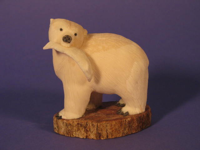 Inuit Art - Artist Signed Polar Bear with Fish: Inuit Art, Polar Bear with Fish, Possibly Ivory or Bone, Artist Signed ''ANINCAYOU,'' Approximately 3'' x 3''.