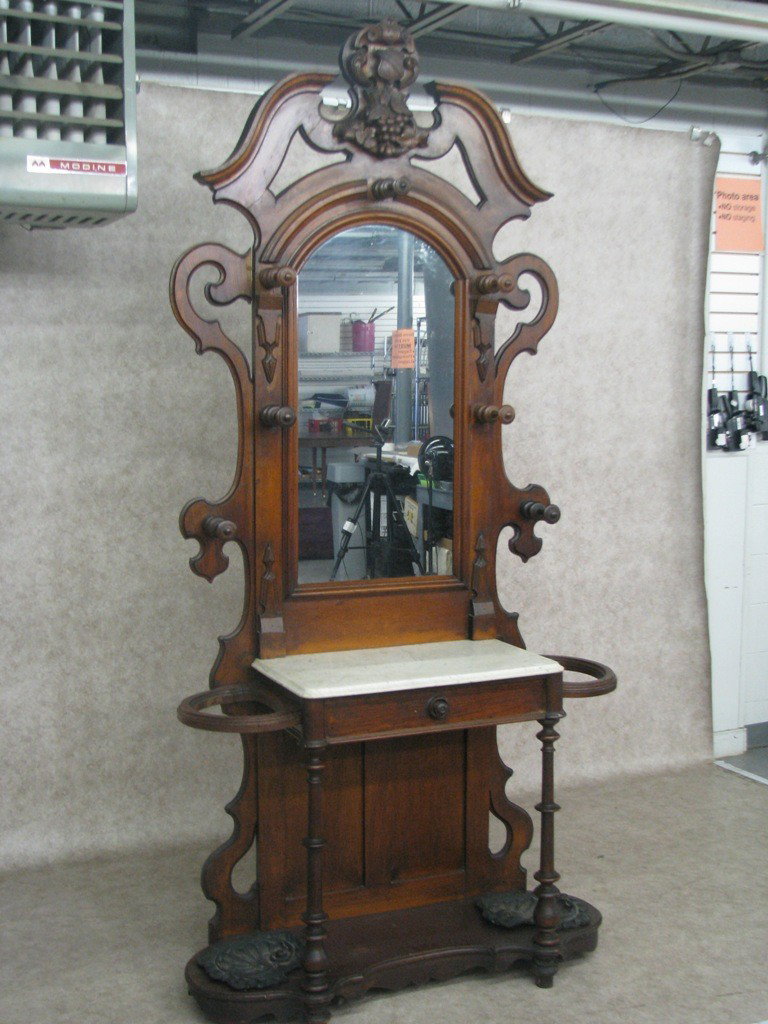 Victorian Hall Tree with Marble Top, Ca. 1865: Victorian Hall Tree, Ash or Chestnut and Walnut, with Marble Top, Circa 1865, with Cast Iron Shell Form Umbrella Drip Pans, 94'' H x 44'' W x 17'' D.