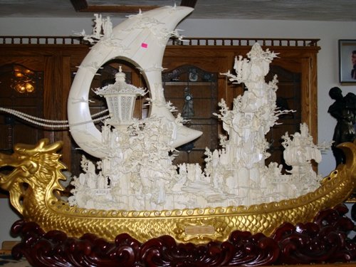 China Antique Elephant and Camel Bone Boat: China Antique Elephant and Camel Bone Boat, dimensions are about 33x15x7, all hand carved, came out of an estate, has a light