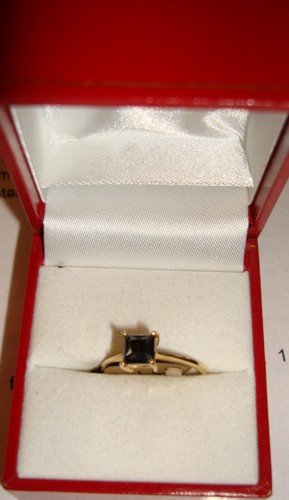 Ladies 10K White Gold Black Diamond Solitare Ring: Ladies 10K White Gold Black Diamond Solitare Ring, princess cut black diamond, 1.00Ct comes with apprasial