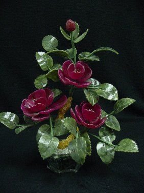 Jade Bonsai Roses: This flower is made of real jade. The leaves are made of Taiwan jade, dark green, as well as the pot. The branches can be bend over, so you can adjust it the way you like. Size: L: 12", W: 8", H: 13".