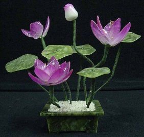 Pink Jade Lotus: The beautiful lotus flower genuine Jade in Guangzhou, China. Its leaf is made of Taiwan Jade and its stem is made of wire covered with silk. It is an ideal decoration for your living room, dinning roo