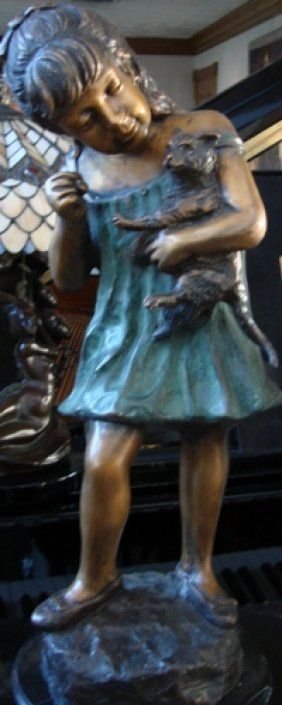 "Little Girl with her Cat" by Moreau: One of a kind bronze sculpture of a girl with her cat by Moreau. Dimensions are 21x7x9