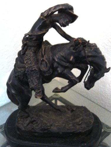 Signed Bronze Rattlesnake Remington: Signed bronze Rattlesnake by Frederic Remington dimensions are about 11x8x4 and weighs about 20lbs