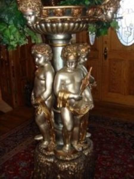 Bronze Cherub Fountain by Moreau: Beautiful patina'd bronze cherub fountain by Moreau. Fountain is pre plumbed, dimensions are about 61x21x13, must use freight shipping