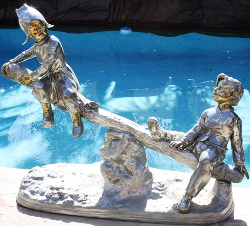 Silver Gold & Platinum Patina Bronze Kids Seesaw: Silver, Gold & Platinum Patina Bronze Kids on See Saw by Moreau, dimensions are about 42x51x14