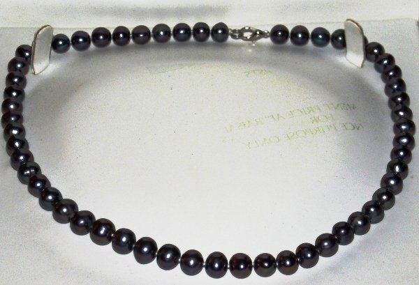 Ladies 18" 9.00mm Black Pearl Necklace: Ladies 18" 9.00mm Black Pearl Necklace is comprised of 55 9.00 mm Black Pearls. The total weight of the necklace is 42.50 grams. Necklace comes with AIG appraisal. 199CCJ