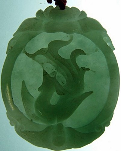 REAL JADE PHOENIX PENDANT (D27-8-20): This pendant is made from one solid piece of jadeite, which is hard and transparent. There is a hold on top of the pendant for you to put a string or necklace. Size: Wide: 1 3/4"(4.5cm). High: 2"(5cm)