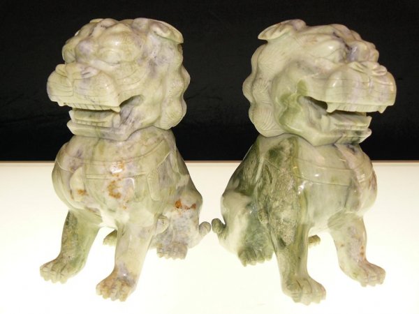 PAIR OF 8" GREEN JADE FOODOGS / LIONS : SKU: HJ018This pair of foodogs is made from one solid piece of Green Southern Jade. It appears light green with some spots dark green. All natural color. Foodog is the ancient lion. They come in a pai
