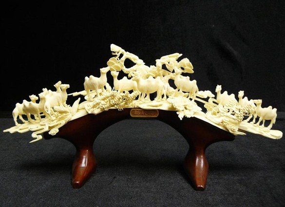 BONE CAMELS JUNGLE: 9746 This beautiful work is made of cow bones. It has very detail carvings and elegant decorations. This work is all handmade and made of real cow bone and beautifully decorated with traditional ornam