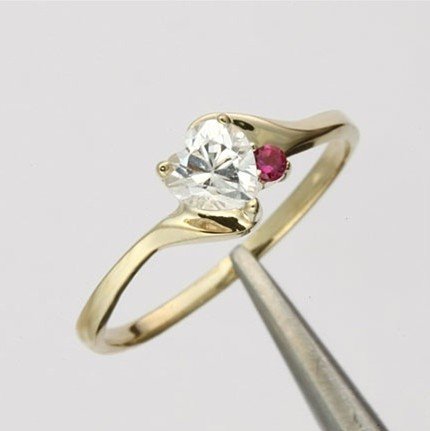 White Topaz Heart & Lab Ruby 10K Gold Ring RGS-729: Gem Type: White Topaz Gem Cut: Faceted Heart Cut Accent Gem Type: Lab Created Ruby Metal Type: Solid Yellow Gold Metal stamp: 10K "Solid 10k Gold" Ring Setting - "NOT" Plated Base Metals Size: 7