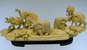 BONE ELEPHANTS JUNGLE: 9605 THIS BEAUTIFUL WORK IS MADE OF ELEPHANT BONES. 5 ELEPHANTS ARE PLAYING BALL IN THE JUNGLE. IT IS ALL HAND-DONE, AND IT IS ABSOLUTE NOT BONE POWDER, PLASTIC, RESIN, OR FISH BONES SIZE: L: 5.5", W: