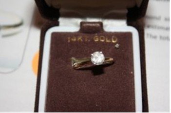 Ladies 14k Diamond Solitaire Ring: this ladies 14k yellow gold diamond solitaire ring comprised of 4 prongs set round brilliant cut diamond. Total estimated diamond's weight is .50ctw. The total weight of the ring is 1.40 grams. Comes 