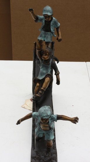 Bronze Kids on Slide Moreau: Bronze Kids on Slide by artist Moreau, dimensions are about 12x13x3 and weighs about 20 lbs