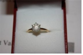 303A: Ladies 14k 1ct Diamond Solitaire Ring: this ladies 14k yellow gold diamond solitaire ring comprised of 6 prongs set round brilliant cut diamond. Total estimated diamonds total weight is 1.00ctw. The total weight of the ring is 2.40 grams. 