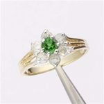 1 ctw. Created Emerald & Diamond 10K Gold Ring RG: 1/2 ct. Genuine Brilliant Round Cut Created Emerald 1/2 ctw. Genuine Brilliant Round Cut Diamonds 100% Genuine Natural DiamondsMetal Type: Solid Yellow Gold Metal stamp: 10K"Solid 10k Gold" Ring Setti