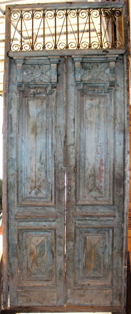 Pair of carved wood & iron entry doors with transom. (1 of 5)