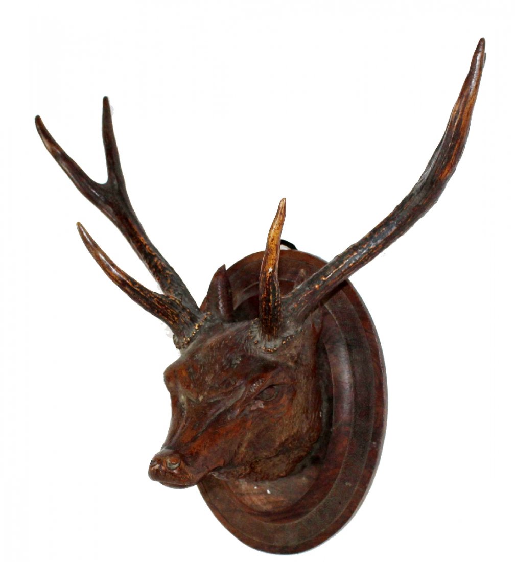 Carved Black Forest deer head with antlers. (1 of 3)