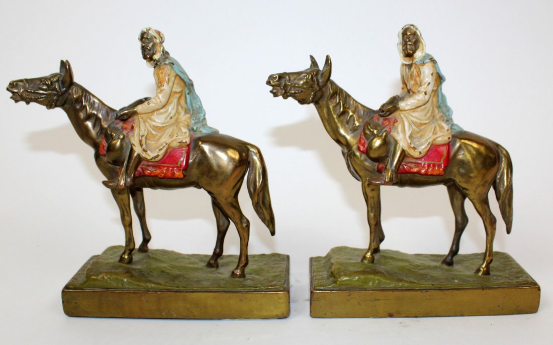 Pair of polychrome Arabian man on horse bookends (1 of 7)