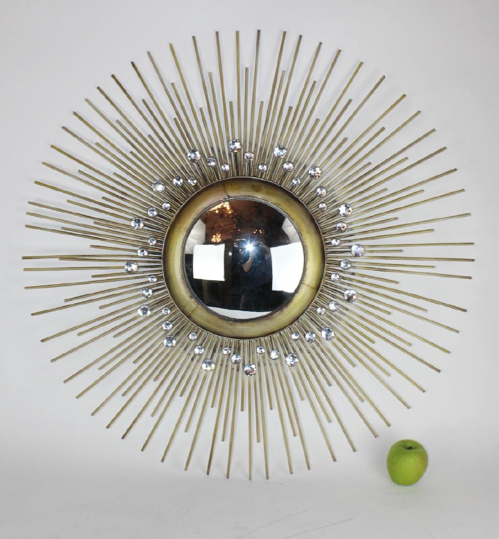 Metal sunburst mirror: Metal sunburst mirror. 35 1/2"dia