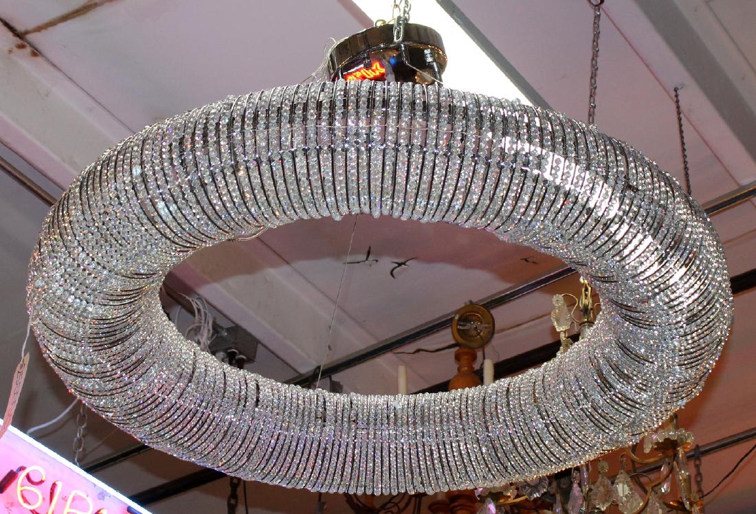 Modern circular ring light with crystal beads: Modern circular ring light with crystal beads. 24" drop x 40"dia