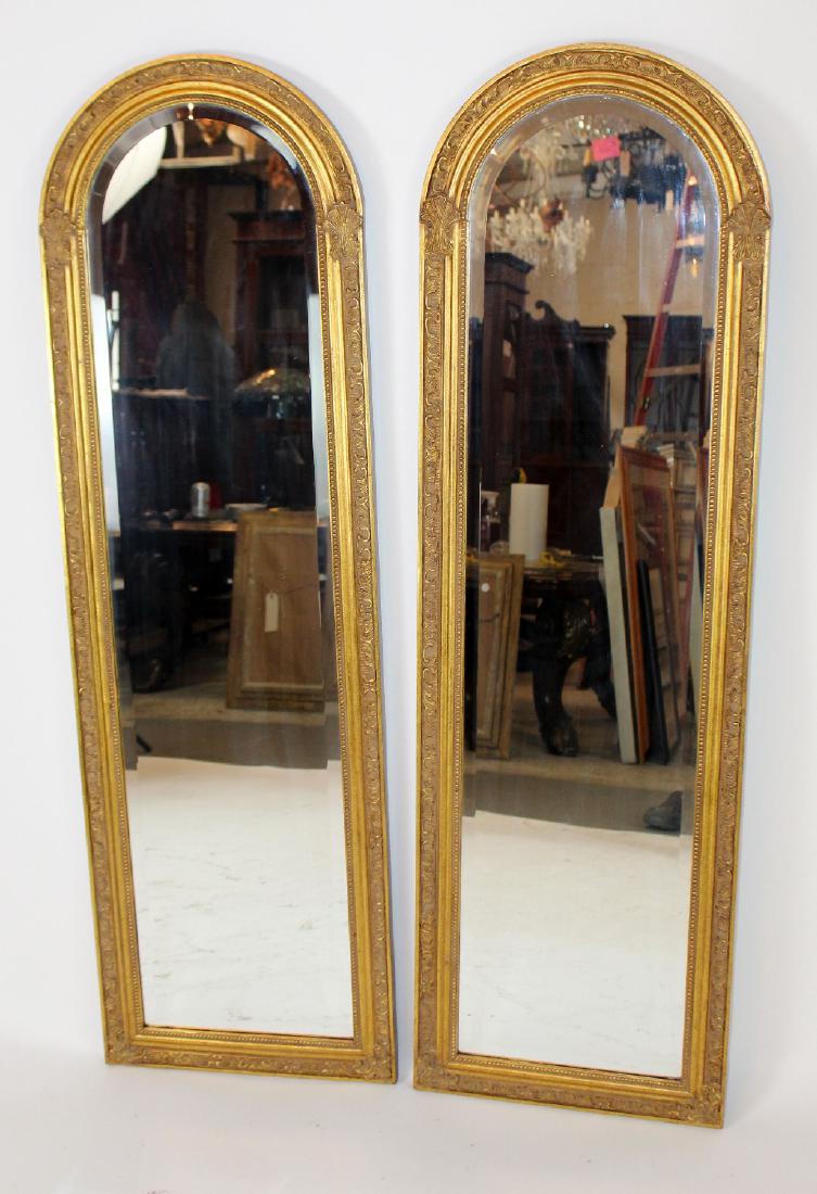 Pair of gold arch top mirrors (1 of 4)