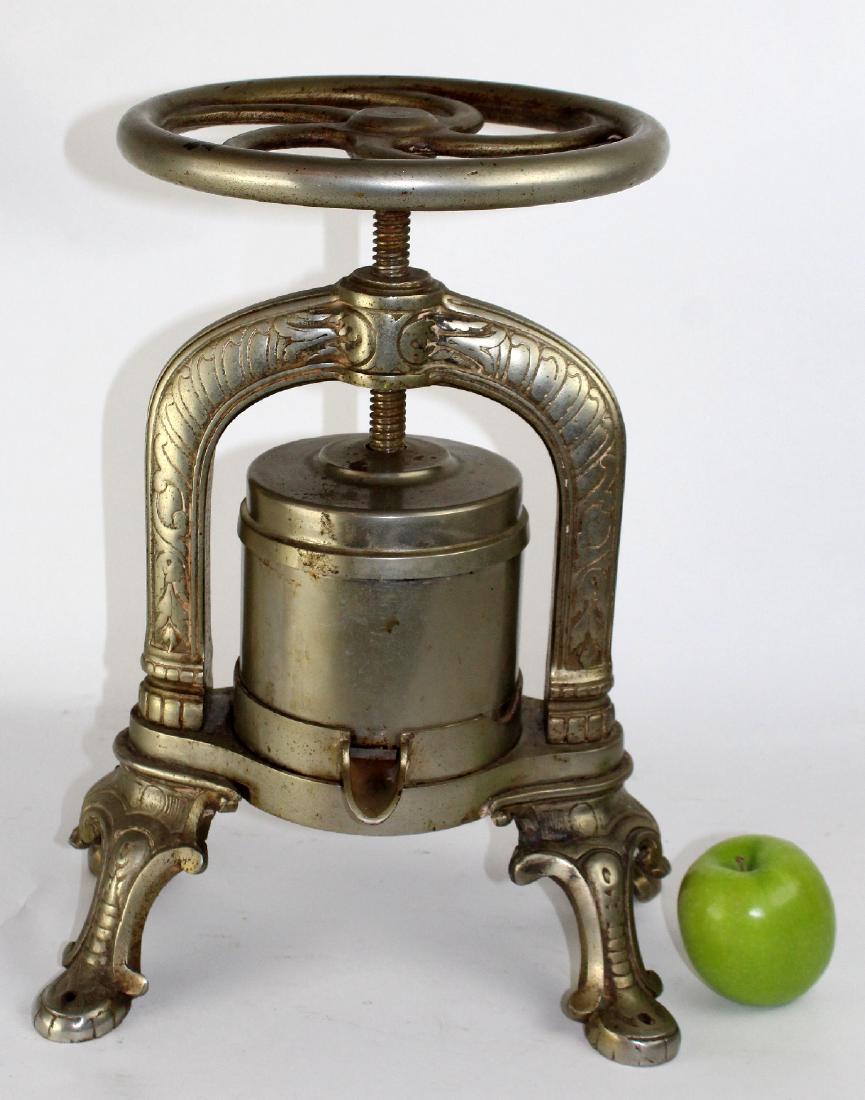 French nickel over cast iron duck press