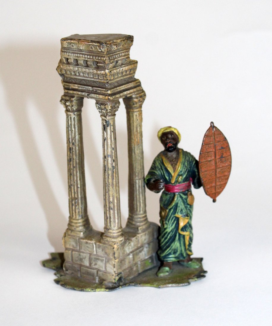 Polychrome bronze figurine with ruins (1 of 3)