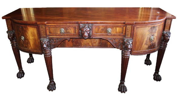 English sideboard flame mahogany: Antique English sideboard in flame mahogany with lion heads and paw feet. 19th century. Fitted interior drawers. 37 3/4"h x 87"l x 25"d