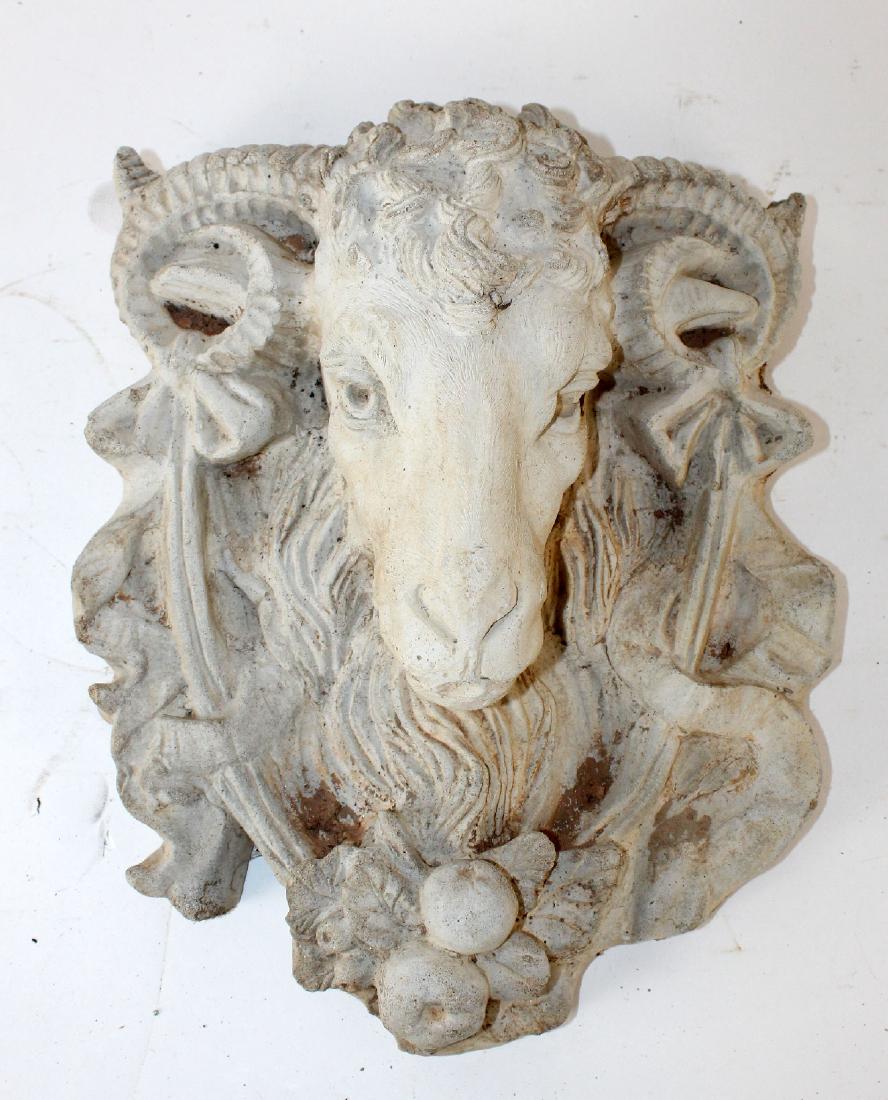 Cast concrete plaque with ram head (1 of 3)