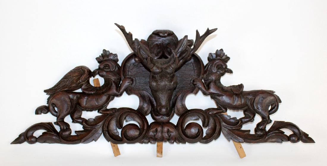 Carved oak overdoor with deer head: Carved oak overdoor with deer head. 13"h x 33 1/2"w