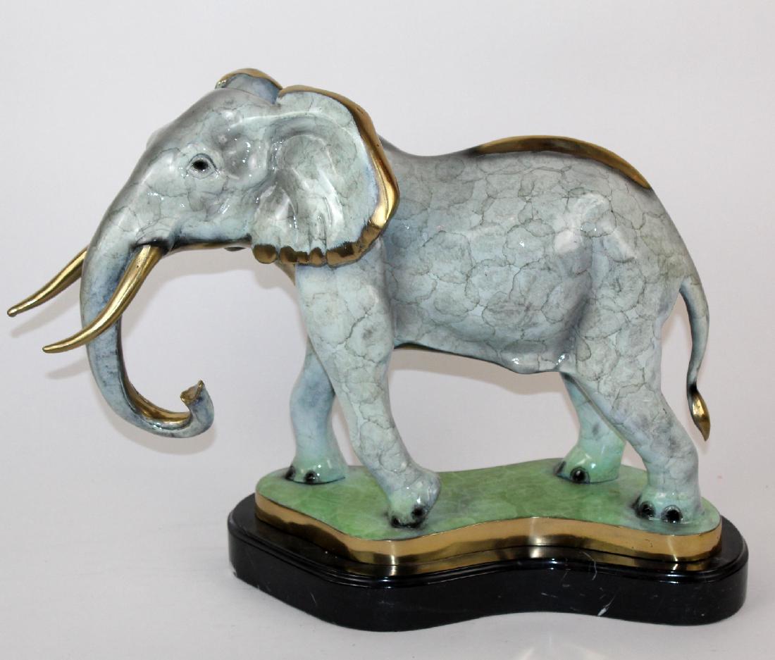 Tri color patina bronze elephant sculpture (1 of 4)
