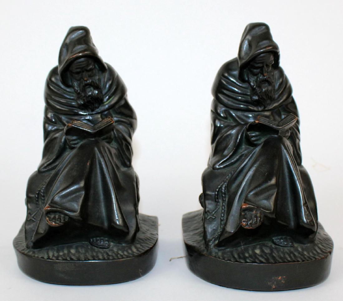 Pair of metal wrapped Monk bookends (1 of 5)