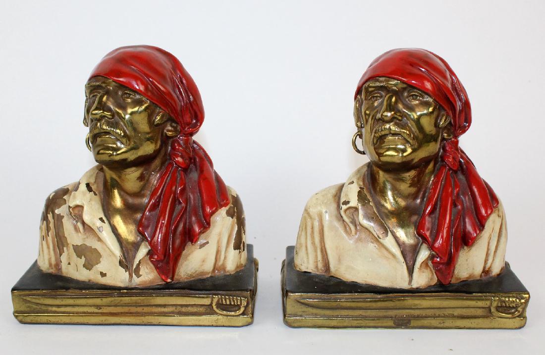 Pair of Paul Herzel Buccaneer bookends: Pair of Paul Herzel designed buccaneer bookends. 6 3/4"h x 6 1/4"w x 3 1/2"D