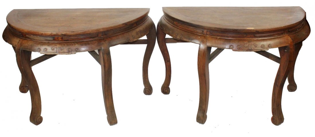 Pair Chinese hardwood demi-lune consoles shown as table: A pair of Chinese hardwood demi-lune console tables. Back to back they make a 48" dia round foyer table. Each console measures 31 1/2"h x 49"w x 24"d