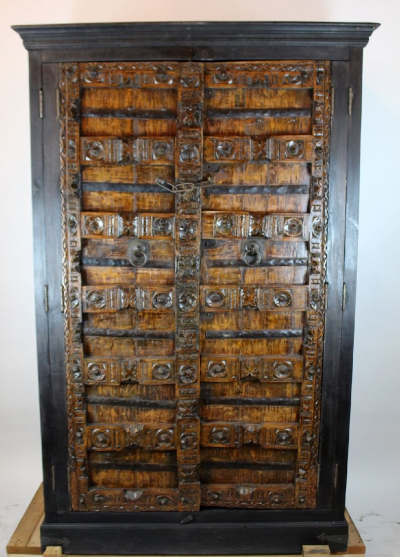 Large scale armoire with temple carved panel doors (1 of 4)