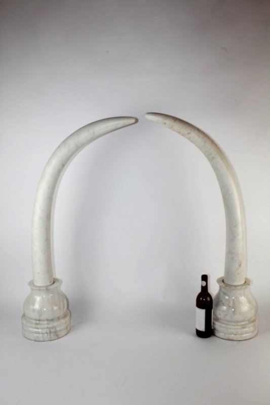 Pair marble tusks on stands (1 of 4)