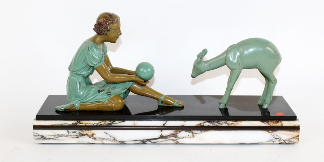 Art Deco depicting girl playing with deer: Art Deco depicting girl playing with deer. 8"h x 16"w x 4 1/4"d